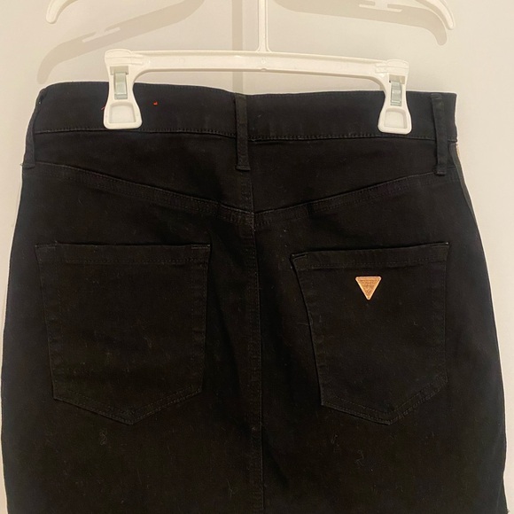 Black mini skirt with metallic gold ribbons on sides. - Picture 2 of 3